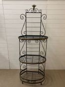 A Wrought iron decorative antique French bakers stand