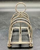 A silver toast rack, hallmarked for London 1903 (Total Weight 97g)