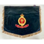 An Antique Blues and Royals embroidered trumpet banner