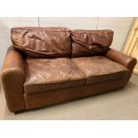 A three seater leather sofa