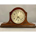 A Mahogany Napoleon Hat eight day mantle clock.