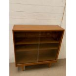 A Mid Century glass fronted bookcase (H100cm W92cm D29cm)