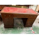 A kneehole desk with red leather top (H75cm W130cm D59cm)