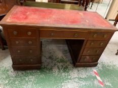 A kneehole desk with red leather top (H75cm W130cm D59cm)