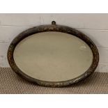 An oval hand painted mirror