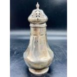 A silver sugar shaker (Total Weight 175g), hallmarked for Birmingham