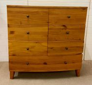 A bow fronted chest of drawers with six small drawers and one long (H114cm W115cm D48cm)