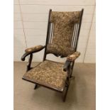 An Edwardian mahogany steamer chair