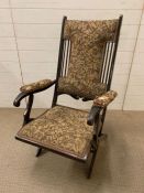An Edwardian mahogany steamer chair