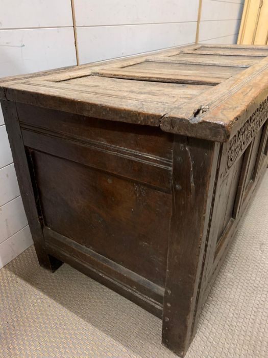 A 17th Century four panelled Coffer with hinged lid raised on bracket feet 135 L x 58 D x 63H - Image 5 of 8