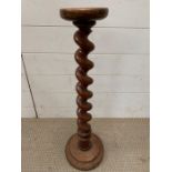 A mahogany spiral turn candle stick stand (H70cm)