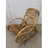 A Mid Century bamboo rocking chair