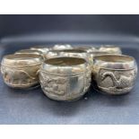 A Selection of twelve Ceylon silver napkin rings (Approx weight 320g)