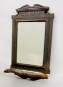 A Cast iron mirror (52cm x 29cm)