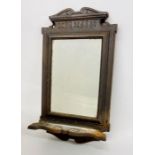 A Cast iron mirror (52cm x 29cm)