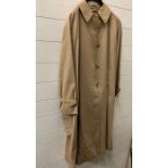 A Vintage Burberry's raincoat or mac.