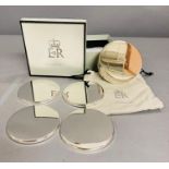 A boxed set of coasters Christmas 2008 Queen Elizabeth II given as a gift to a member of the Royal