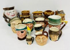 A selection of small character jugs including Royal Doulton