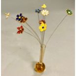 Ten enamel flower and glass vase