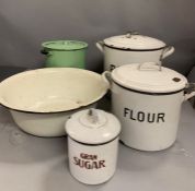 Four large metal cooking pots and one other
