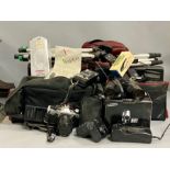 A large volume of photography equipment, cameras etc.