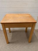 A children's pine desk (H61cm W60cm D46cm)