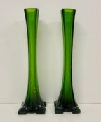 A pair of green 1970's tall vases on square base