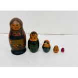 A wooden nesting doll set consisting of five pieces