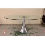 An Oval Glass Dining Table on Central stand