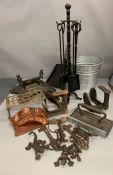 A selection of various brass, copper and iron items