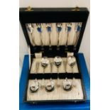 A boxed set of silver plated forks and spoons