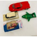 Four various toy vehicles