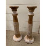 A pair of wooden candle sticks (H46cm)