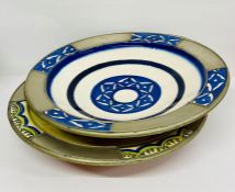 Two Persian influence stoneware and metal bowls.