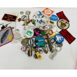 A selection of various badges and keyrings