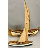 Two decorative model boats