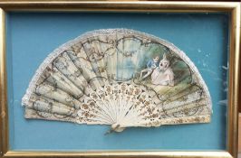 A Victorian hand painted and mother of pearl fan with a scene galante and floral gilt decorated