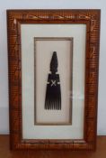 A hand carved vintage African wooden comb, from the personal collection of the Oscar winning art