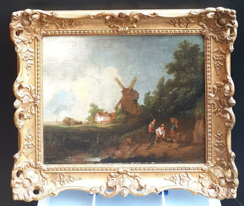 A follower of Norwich School, 'Works near a windmill', oil on panel, within a Louis XIV style gilded