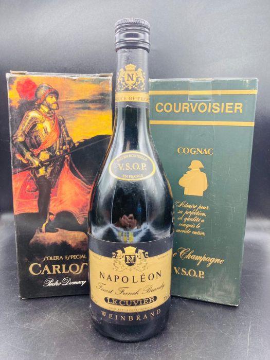 A Bottle of Pedro Domecq, A Bottle of Napoleon brandy and a bottle of Courvoisier