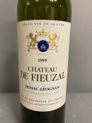 A Bottle of 1999 Chateau De Fieuzal Pessac Leoghen