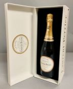 A boxed bottle of Laurent Perrier champagne