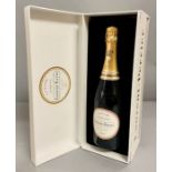 A boxed bottle of Laurent Perrier champagne