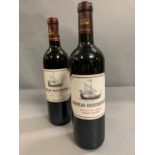 A Bottle of 2000 Chateau Beychelle along with a bottle of 2008.