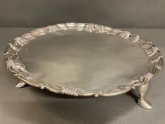 A substantial Continental silver tray on hoof feet (one foot is present but detached) (Total