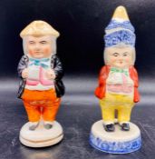 Staffordshire salt and pepper pots in the figure of men.