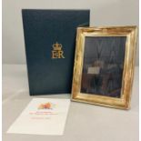 Hallmarked silver picture frame given as a gift to a member of the Royal household staff by Queen