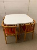 A Mid Century Thonet 60/70's square table with four nesting chairs.