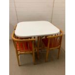 A Mid Century Thonet 60/70's square table with four nesting chairs.