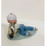 A boxed Lladro porcelain figurine "All Aboard" No 7619